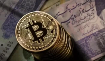 Stack of golden Bitcoin coins placed on Pakistani currency notes, representing the concept of cryptocurrency in Pakistan’s financial landscape.