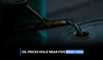 Oil prices hold near five-week high