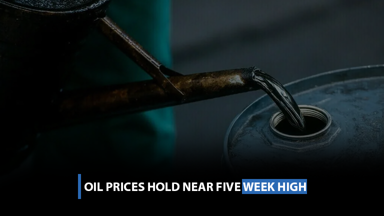 Oil prices hold near five-week high