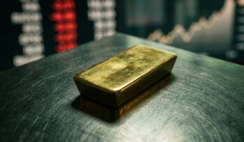Gold falls over 2% as rate-hike expectations rise